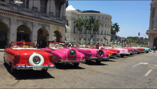 Photo of several Classic Chevy's in Cuba.
