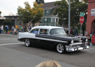 Black and White Chevy Bel Air driving in the 2016 Petaluma Vets Parade.