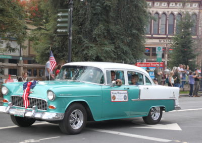 Cars driving during the 2016 Petaluma Veteran's Day Parade