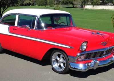 A Red and White Classic 1956 Chevy Bel Air.